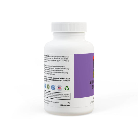 White bottle of sea moss supplement capsules with purple label and health information